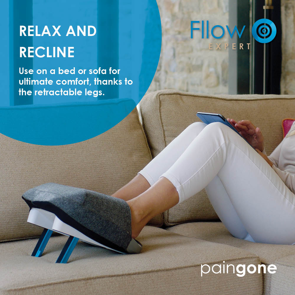 Person using Fllow with foot cover on the sofa for ultimate comfort