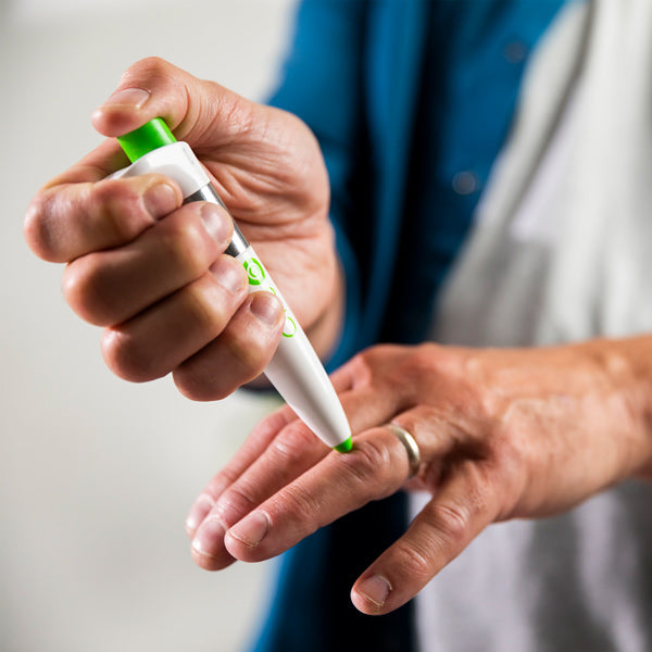 Paingone One pen being used for finger pain